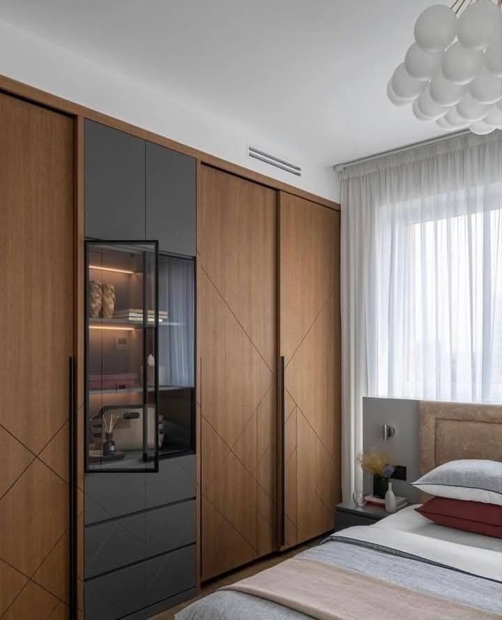 Custom wooden almari designed by Deluxima in Gurgaon